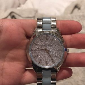 MK sliver and blue watch
